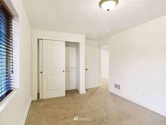 Building Photo - 3-Bedroom Apartment with Fenced Backyard N...