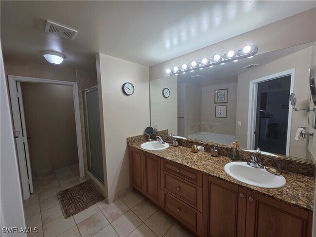 Building Photo - 10127 Villagio Palms Way