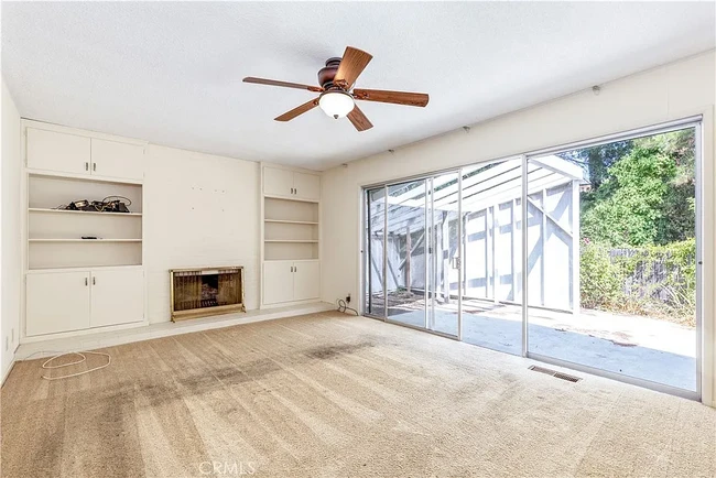 View of family room before new floors - 679 Rancho Dr