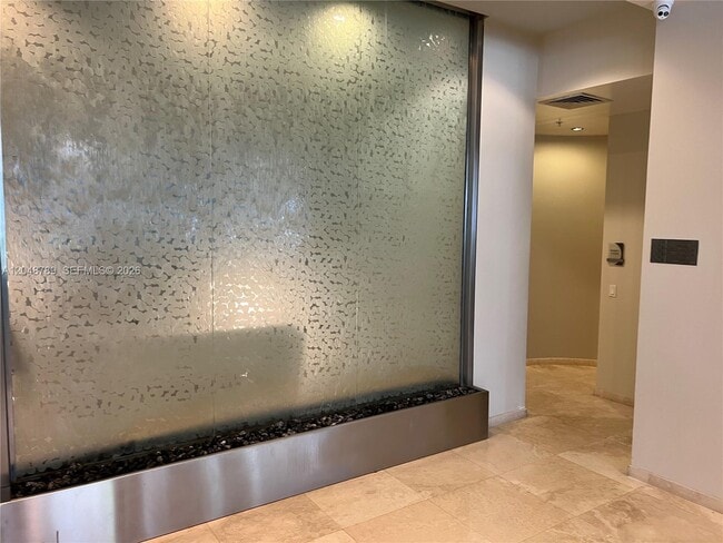 Building Photo - 10275 Collins Ave
