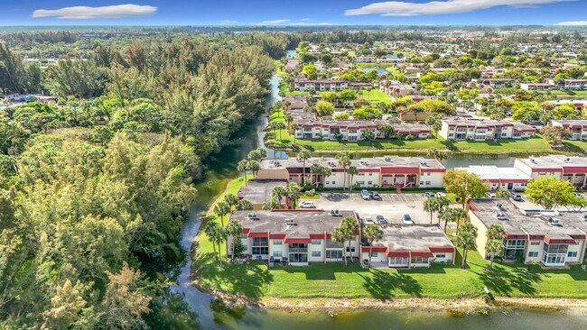 Building Photo - Desirable 55 plus community condo unit with a view of the lake on the 2nd Floor.