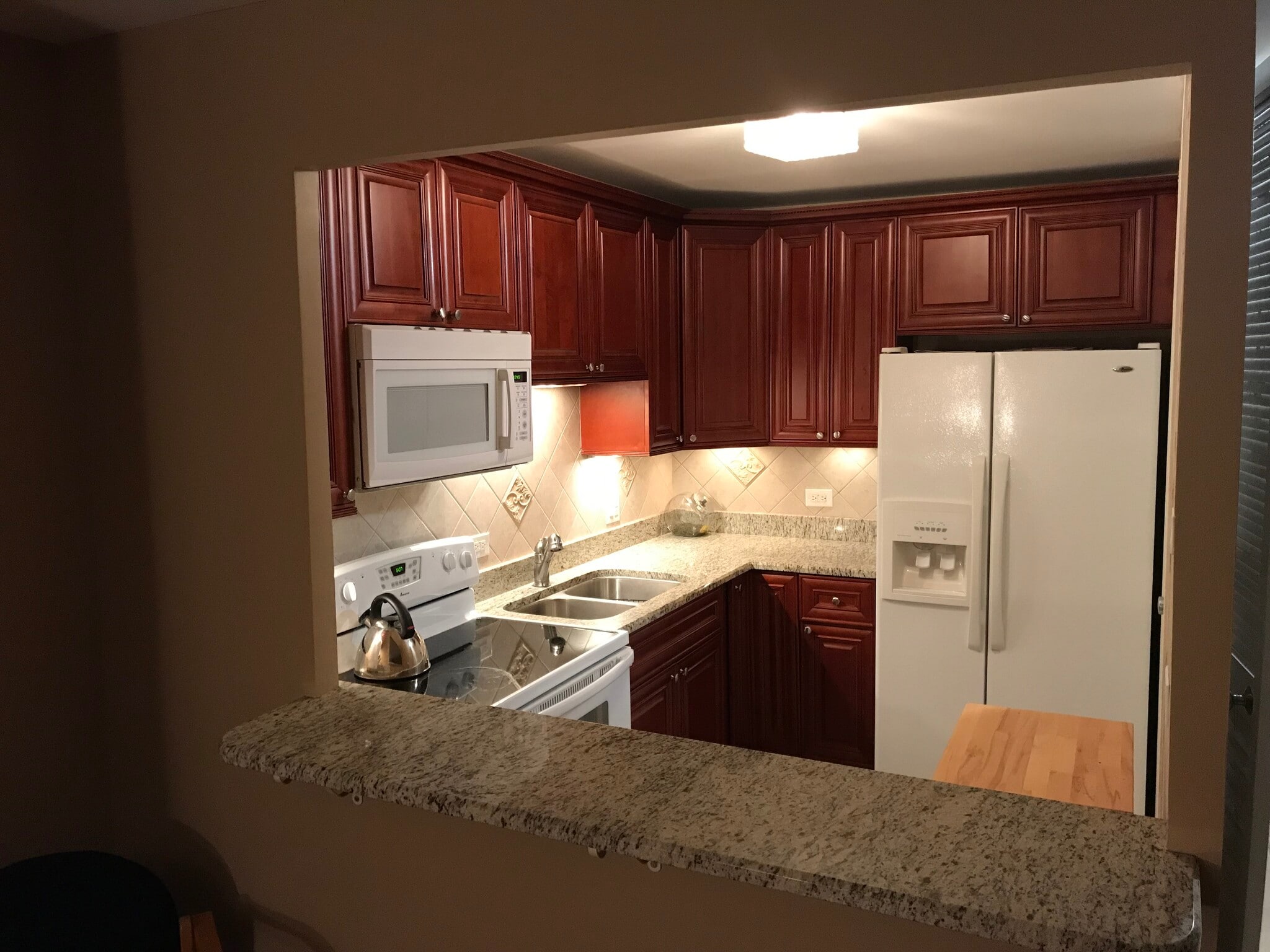 Kitchen pass thru countertop - 4800 S Chicago Beach Dr