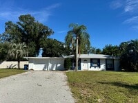 Building Photo - 2/2 with Fenced Yard, Garage and Laundry, ...