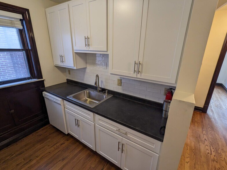 Kitchen with new appliances - sink side - 6633 Alamo Avenue