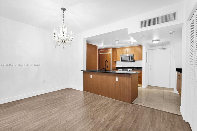Building Photo - 10275 Collins Ave