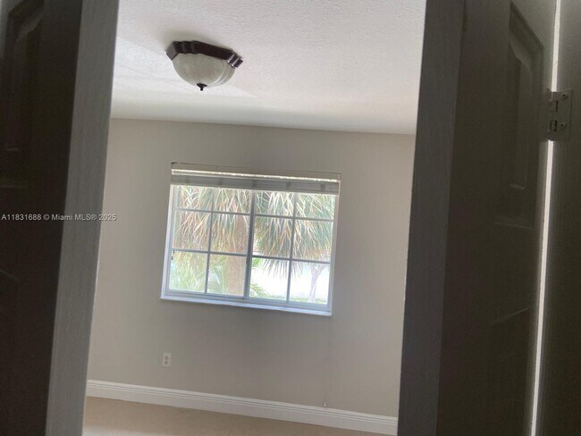Building Photo - 7289 NW 173rd Dr