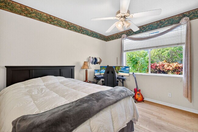 Building Photo - This 2 bedroom plus den, 2 bath condo with a one car garage offers expansive golf course and lake...