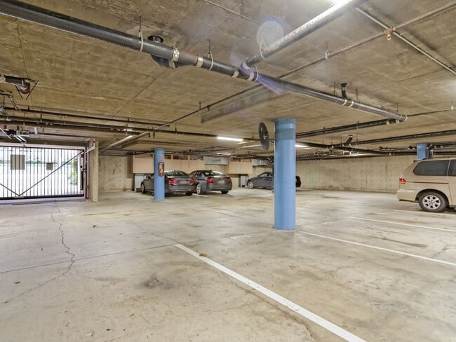 Building Photo - Water, Sewer, Trash Included! Fireplace, Washer, Dryer, 2 Assigned Parking, Garage, Open Floor Pl...