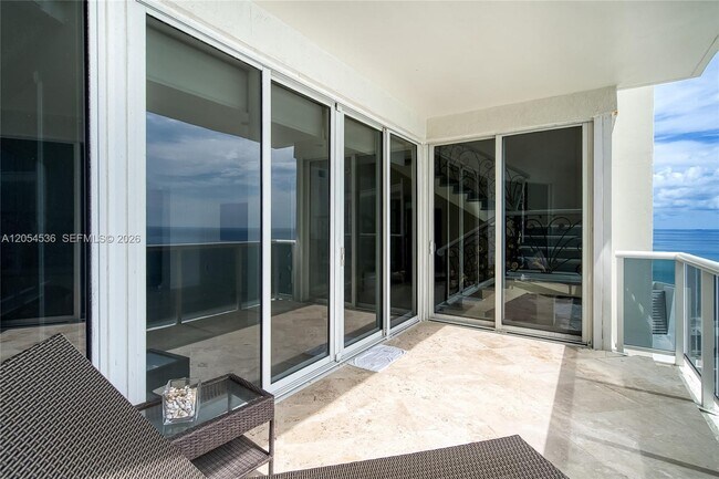 Building Photo - 19111 Collins Ave