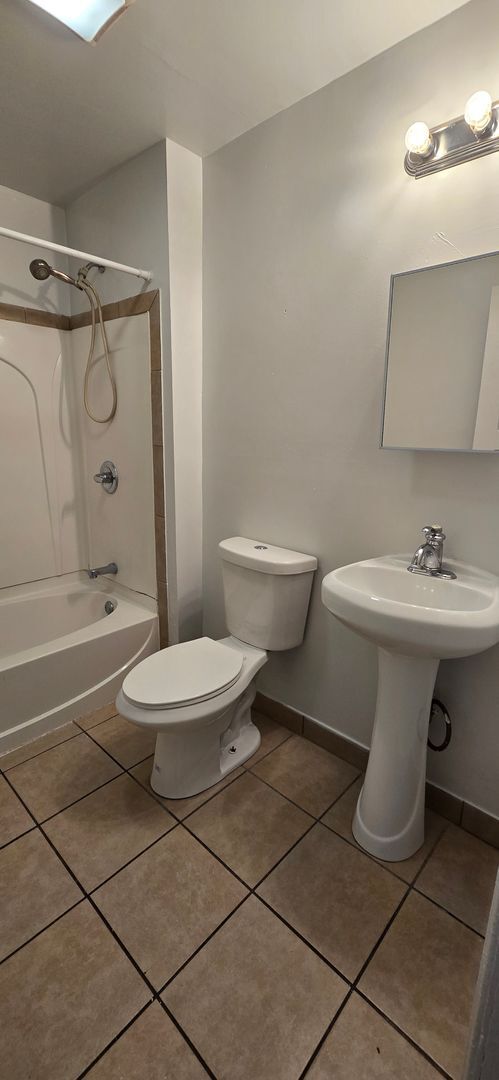 Building Photo - Large remodeled 4 bedroom with off street parking available**FREE MONTH OF RENT TO ANYONE WHO SIG...