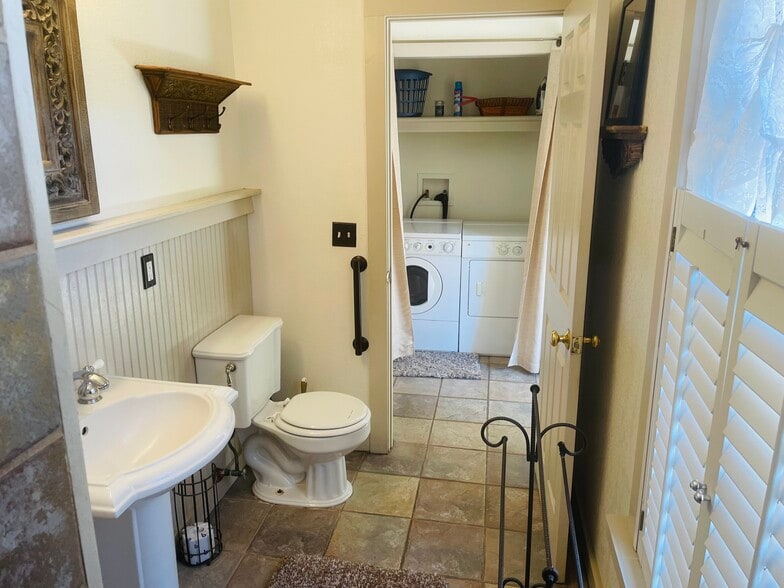 Rear view of Bath leading into foyer off Bedroom - 541 E Jones Ln