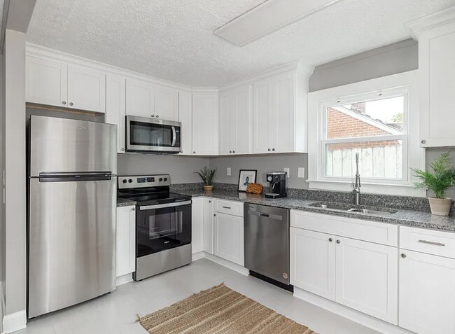 Building Photo - Vintage Charm, Modern Comfort & a Fully Fenced Backyard in Madison