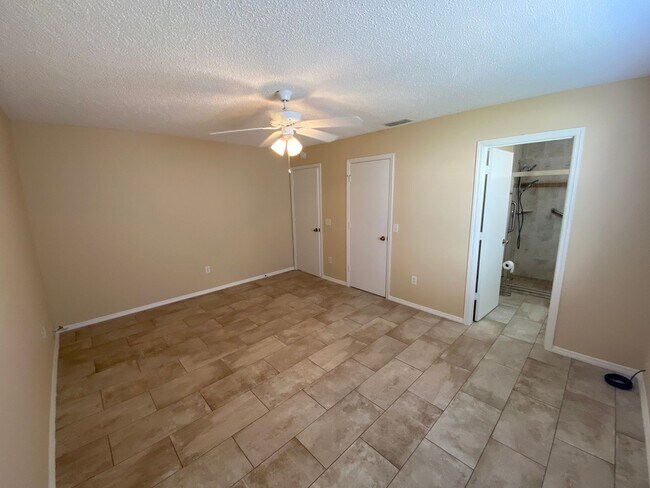 Building Photo - Charming Just Renovated Unfurnished ANNUAL LEASE - 2 Bedroom 2 Bath Patio Villa - Located In The ...