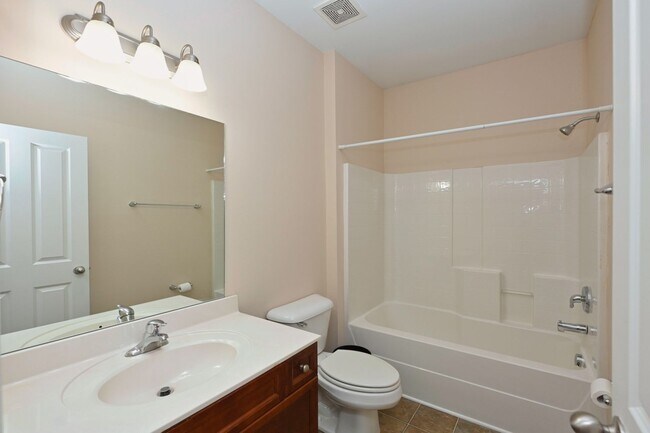 Building Photo - **PRISTINE GARDEN-LEVEL CONDO ON THE FIRST LEVEL NEAR PAVILION AND COMMUNITY GREEN SPACE**