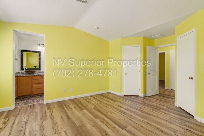 Building Photo - NW!! 4 Bedrooms!!! All Tile and Pergo flooring T/O!! NO Carpet!!! Low Maintenance Desert landscap...