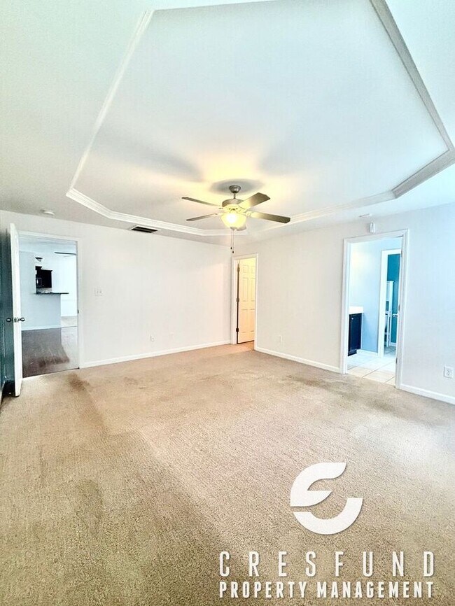 Building Photo - Freshly Painted and Spacious 4 Bedroom, 3 ...