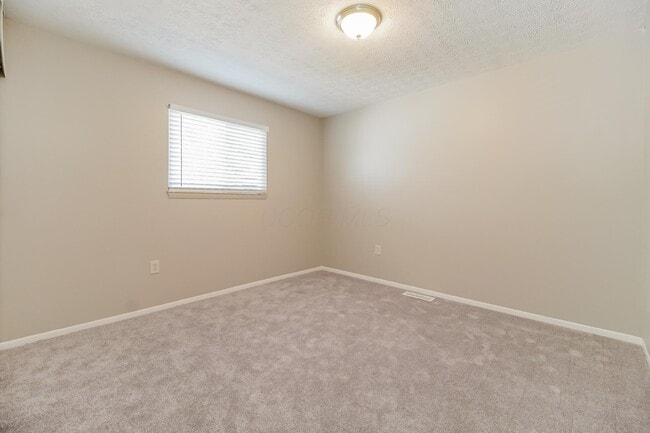 Building Photo - 6560 Benjamin Dr