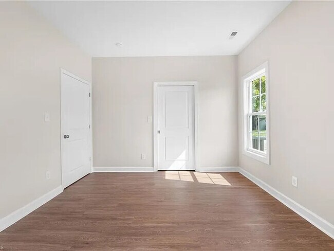 Building Photo - Earn Wealth While Leasing - Like a Homeown...