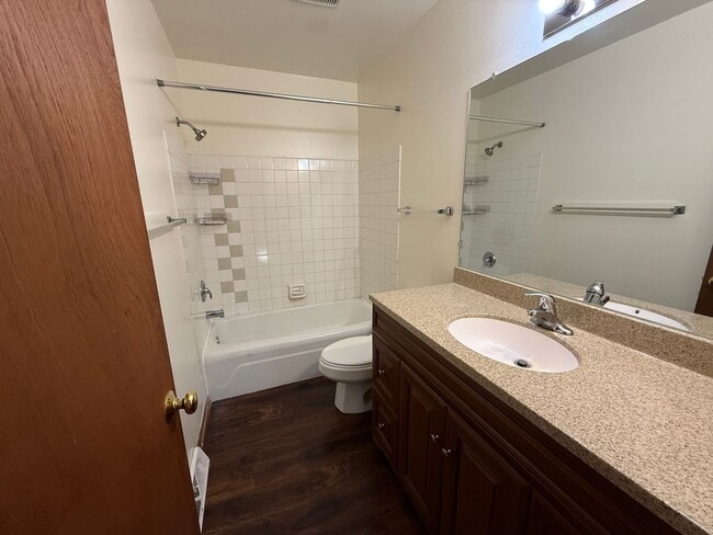 Building Photo - August 15th rent special! New deck! 3 Bedroom, updated kitchen, updated flooring, garage, drivewa...