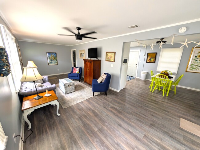 Bright and cozy living room with open floor plan! - 4107 Crane St