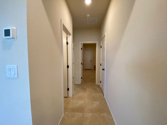 Building Photo - 4 BED 3 BATH Townhome, 1 LOFT, 2 GARAGES, GATED!