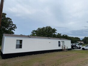 Building Photo - 2/1 single wide outside city limits