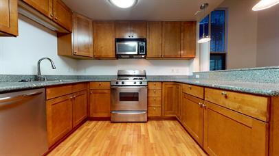 Building Photo - "Chic Urban Living: Spacious 2BR/2BA Condo...
