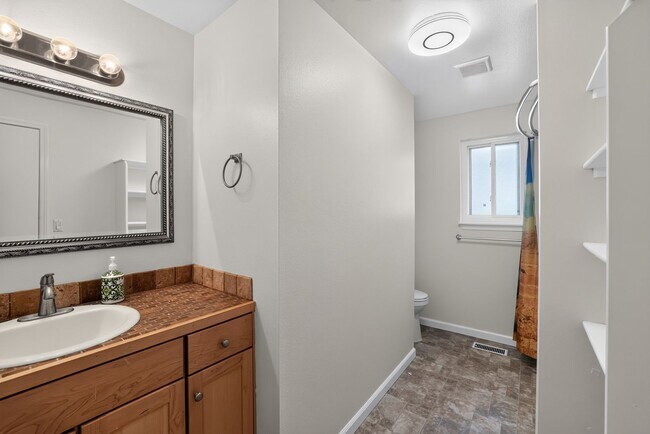 Building Photo - Charming Single-Level Home with Fresh Updates & Pet-Friendly Yard!
