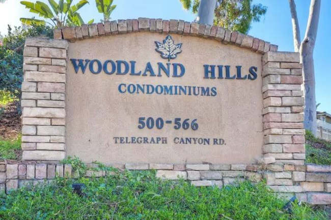 Welcome to our community — easily locate the home w/ this mounted wall brick - 524 Telegraph Canyon Rd