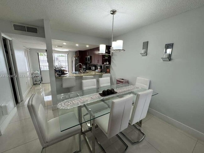 Building Photo - 5083 W 12th Ln