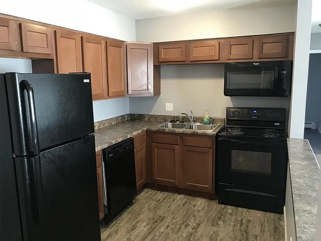 Building Photo - $500 off 1st month rent!! COME APPLY TODAY! Affordable Des Moines Living: 2 Bed + 1 Bath at Eastb...