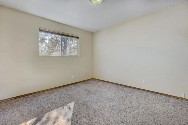 Building Photo - 1/2 acre in the with RV Hook ups