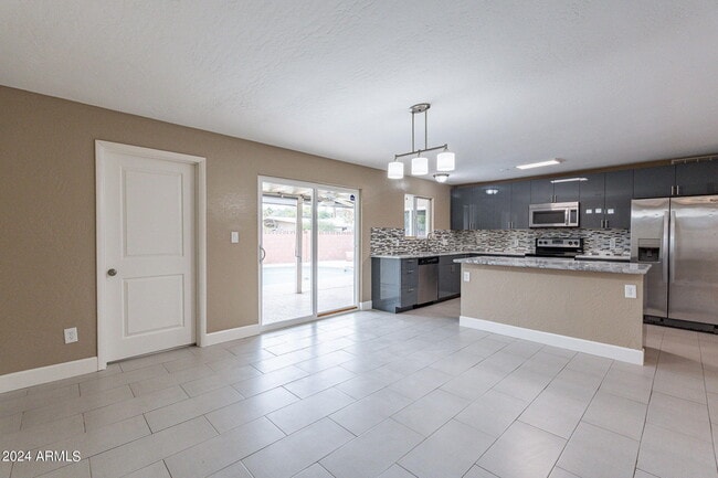 Building Photo - 1320 E Orchid Ln