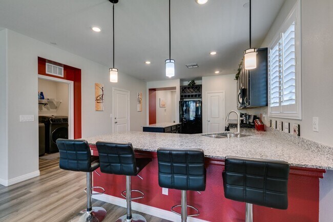 Building Photo - Furnished 5-Bedroom Home with Two Primary Suites