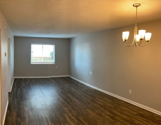 Building Photo - Just off the main road, but in walking dis...