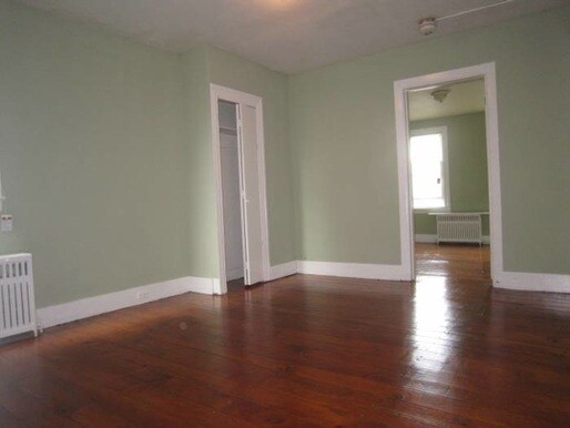 Building Photo - Wood floors, fresh paint, coin laundry, shared yard