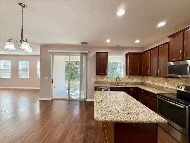 Building Photo - SPACIOUS Two Story Beautiful 5/4 Home in The Enclave At Aloma!