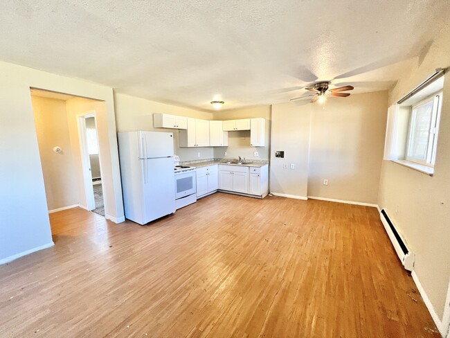 Explore this inviting kitchen and living space, perfect for modern living. - 1690 Eaton