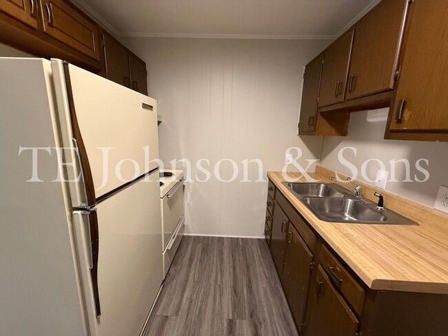 Building Photo - COMFORT, CONVENIENCE AND AFFORDABILITY! Ju...