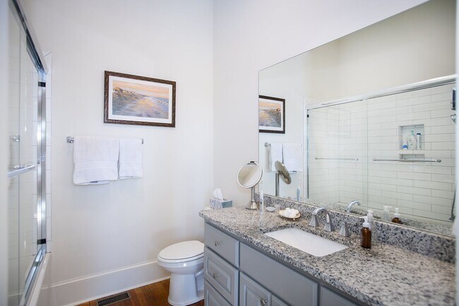 Building Photo - Spacious 3 Bedroom/3 Bathroom Townhome with Private Rooftop Deck