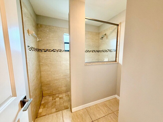 Building Photo - Move-In Ready 3BR Home in SW Cape Coral with Fenced Yar+Screened Lanai+Lawn Care Included+Pet Fri...