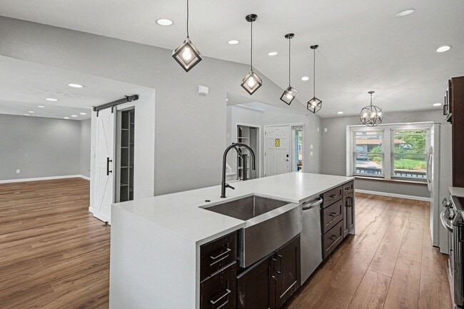 Building Photo - Updated 4BR Corner Lot Home with Finished Basement & 2-Car Garage