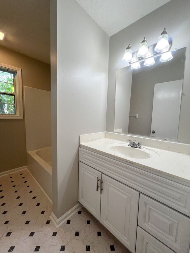 Building Photo - Move-In Specials Available! Large Deck and...