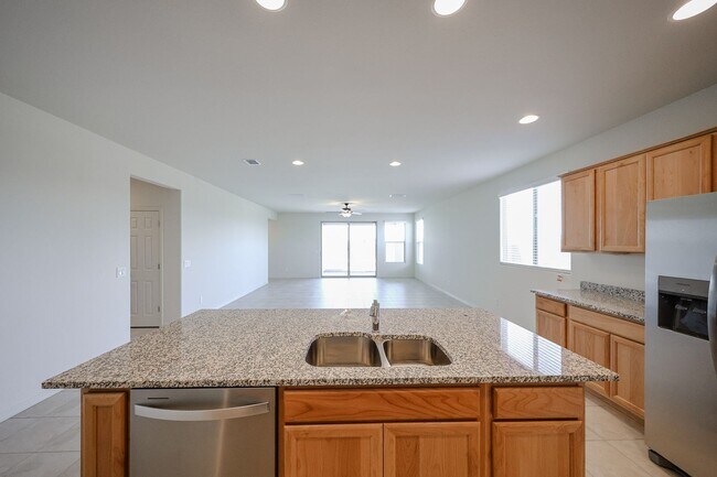 Building Photo - New 4 Bedroom + Den Home in Asante Community