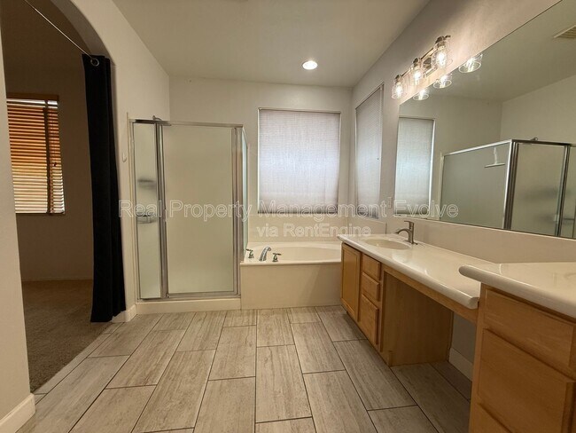 Building Photo - 8278 W Charter Oak Rd