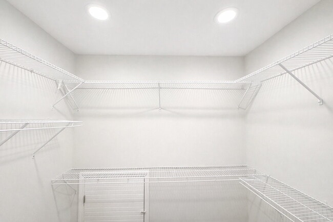 Building Photo - Gated Johns Creek Townhome Offering Space, Privacy, and Everyday Convenience