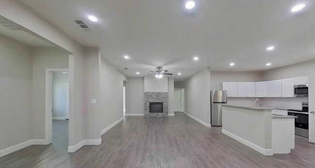 Building Photo - Spacious, Stylish, and Simply Perfect — 4 Bedroom Home