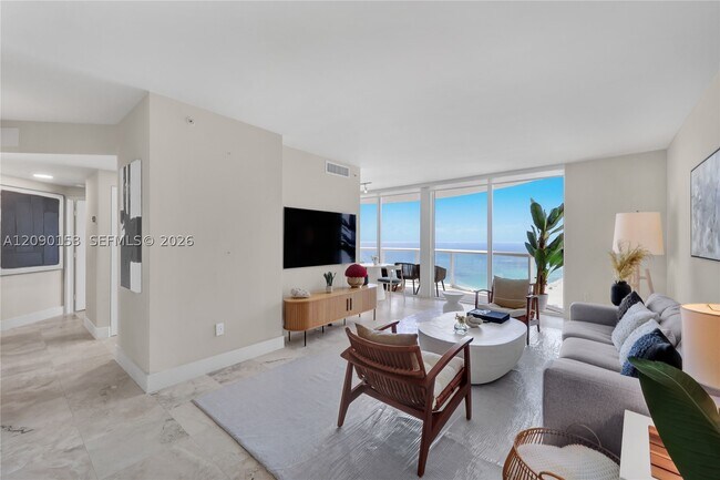 Building Photo - 6365 Collins Ave