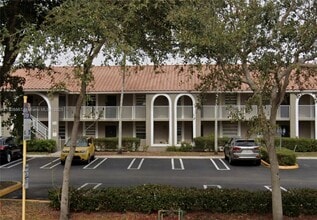 Building Photo - 11213 Royal Palm Blvd