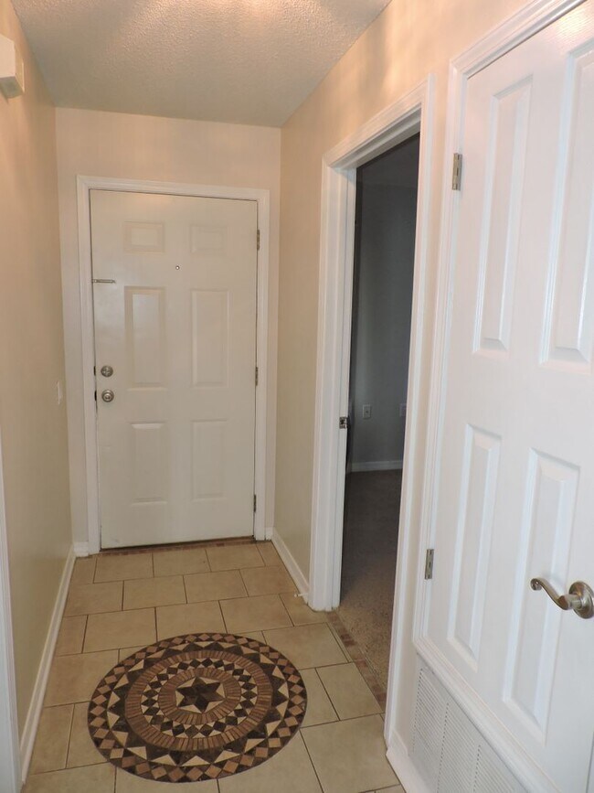 Building Photo - Easy access to shopping, interstate & Navy Federal complex!